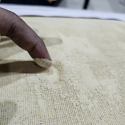 Close-up of the Tayammum surface showing fine clean natural dust for performing Islamic dry ablution.